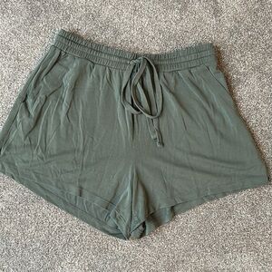 green flowy shorts